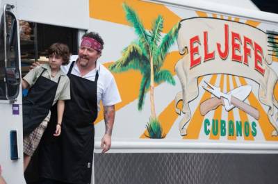 Chef Leaning Out of Food Truck